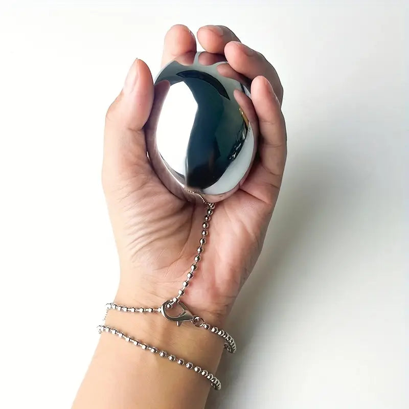 Metallic Stainless Steel Chain-Attached Elliptical Butt Plug For Outdoor Wear